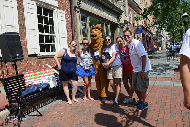 Nittany Lion posed with a group of people during Penn State Lehigh Valley Day