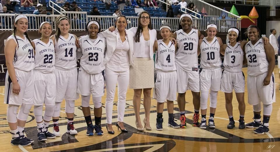 PSU-LV women's basketball team and coachs on court