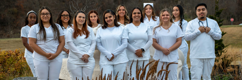 Nursing students smiling at camera 