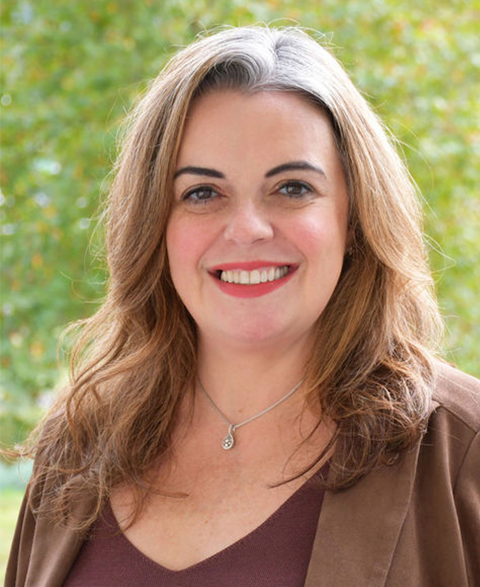 Woman smiling, Looking at camera.