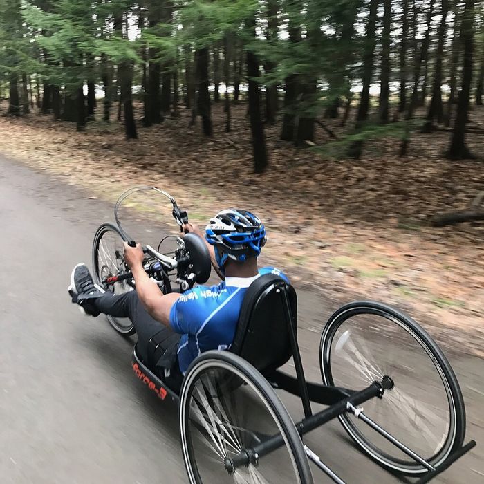 Athlete riding on a hand cycle bike