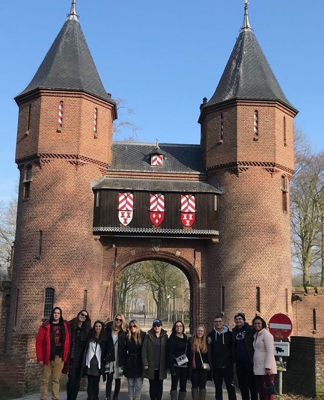 Group of students in front of castle in Amsterdam