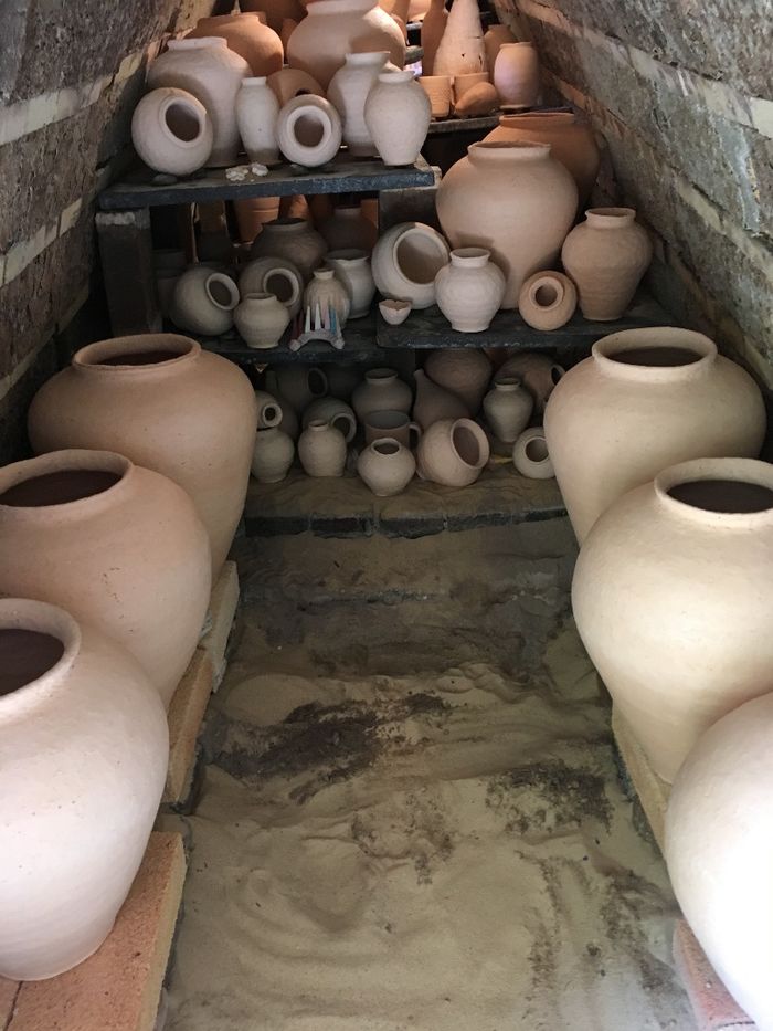 many pieces of pottery