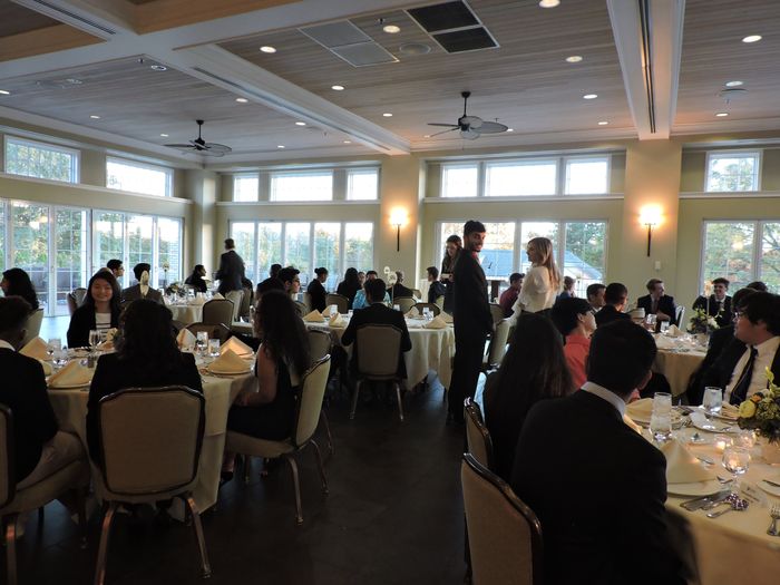 Students at a country club for Etiquette Dinner event