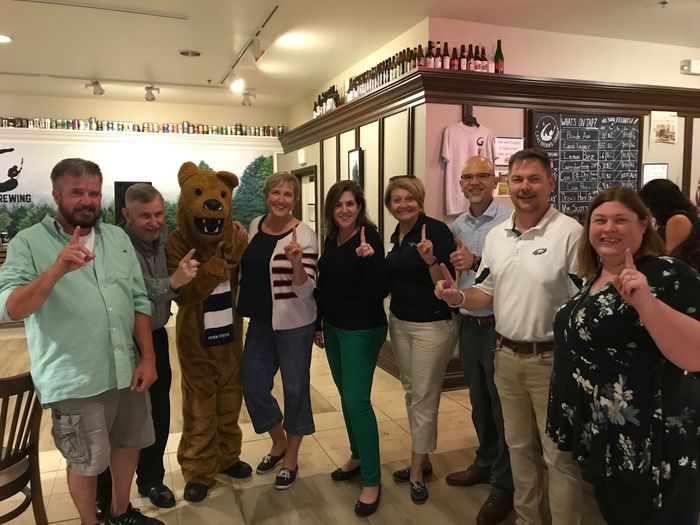 group of people with Nittany lion