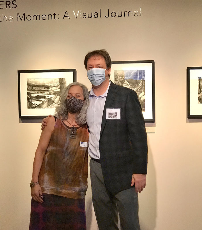 Penn State Lehigh Valley Gallery Director Ann Lalik stands with artist Jason Travers