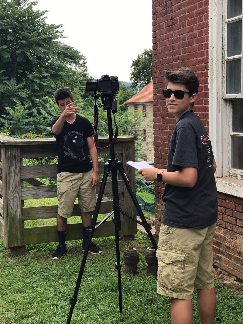 two campers shooting video footage