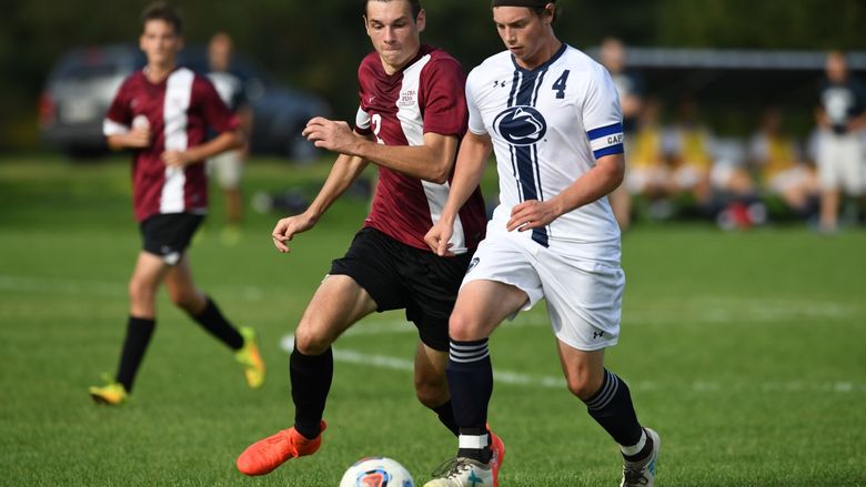 Students playing soccer