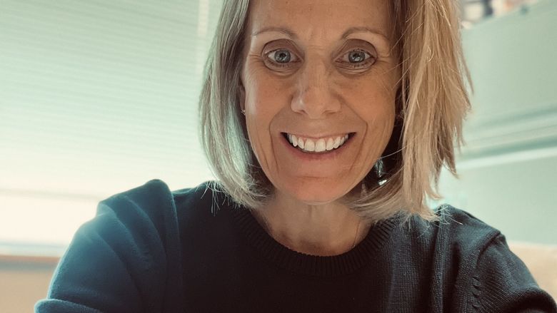 woman smiling at camera 