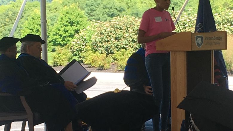 Young woman at podium