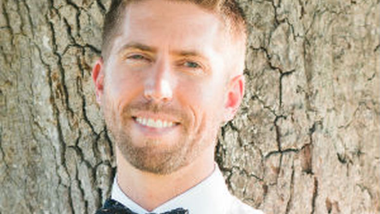 head shot of David Whitlock by a tree