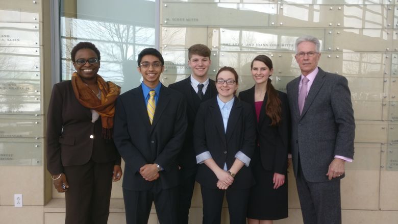 Team who placed fourth with club adviser and administrative fellow