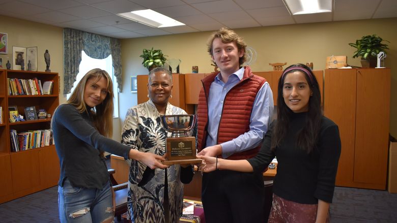 three students and chancellor 