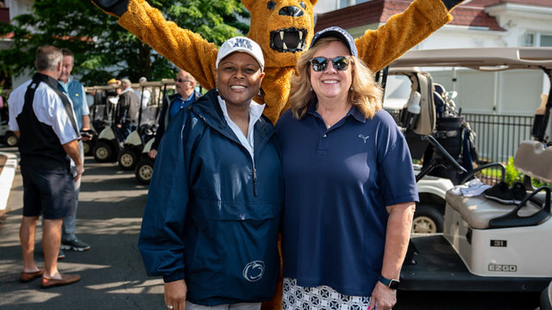 two women with Nittany Lion