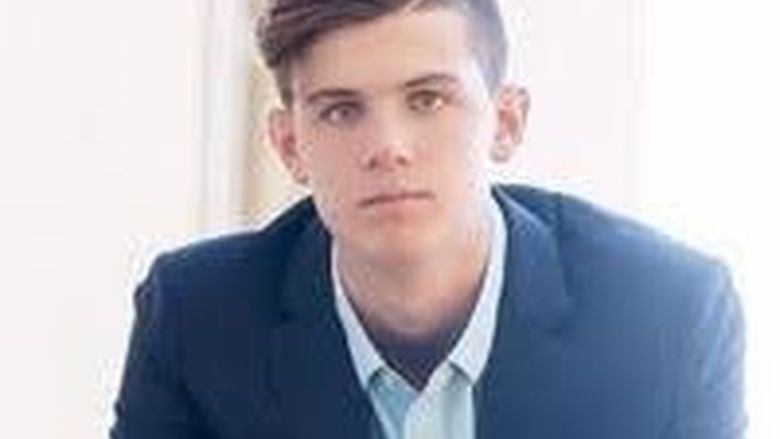 young man in a suit jacket 