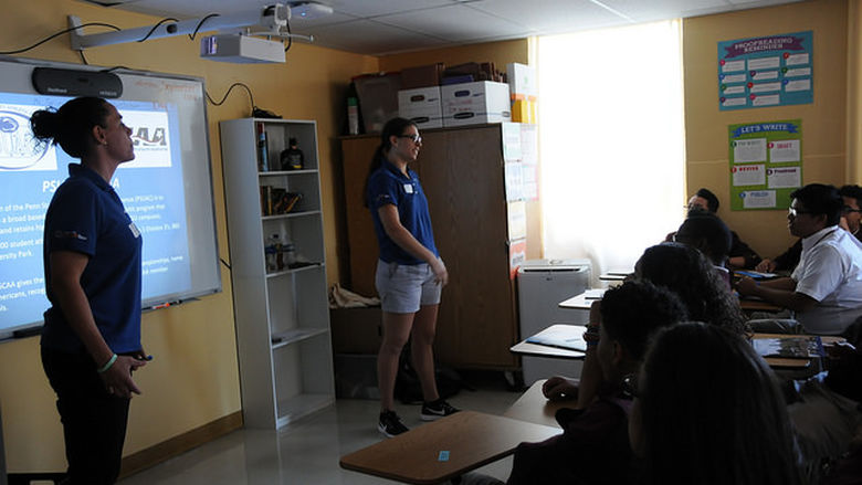 Coaches presenting to students