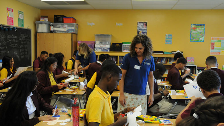 Art teachers leading class in a project