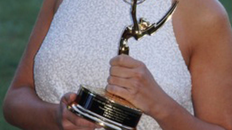 Liz Keptner with her Emmy award.
