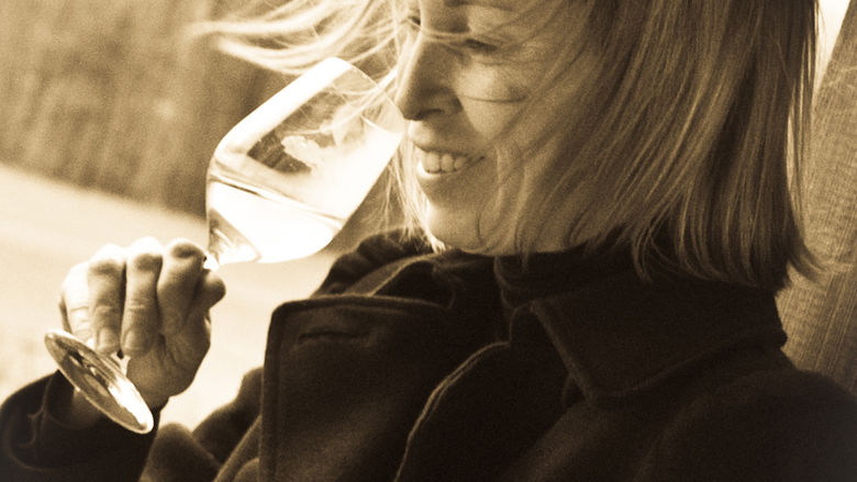 Woman drinking out of wine glass