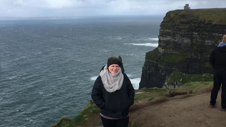 A student near the Cliffs of Moher