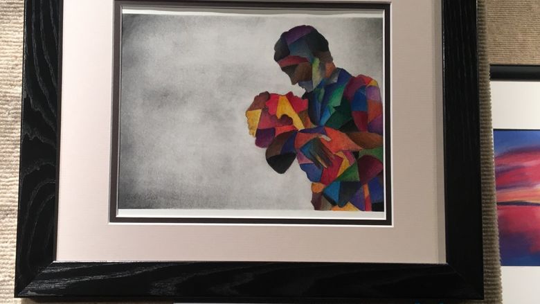 colored pencil drawing in a frame on display