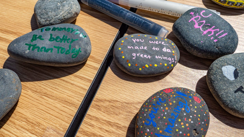 Kindness rocks featured on table at PSU-LV Arts Fest 