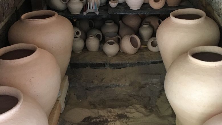 many pieces of pottery