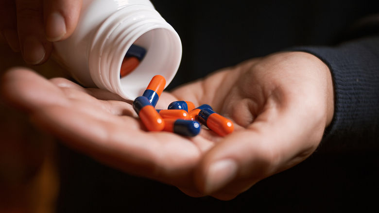 pills being poured into hands