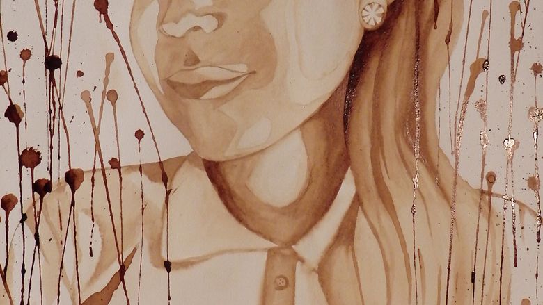 painting of girl using coffee extract on watercolor paper
