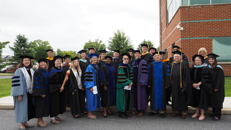 group of faculty in regalia