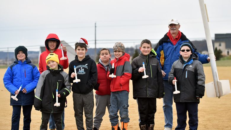 Cub scouts with rockets