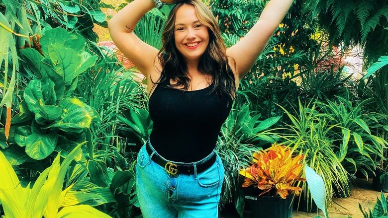 headshot of Angela DeGrosso in greenhouse