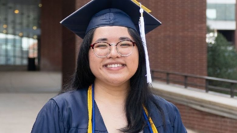 Penn State Student In cap and gown