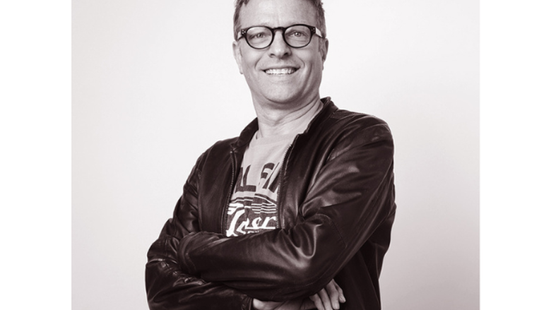 A headshot of PSU grad and Allentown artist, Denis Aumiller