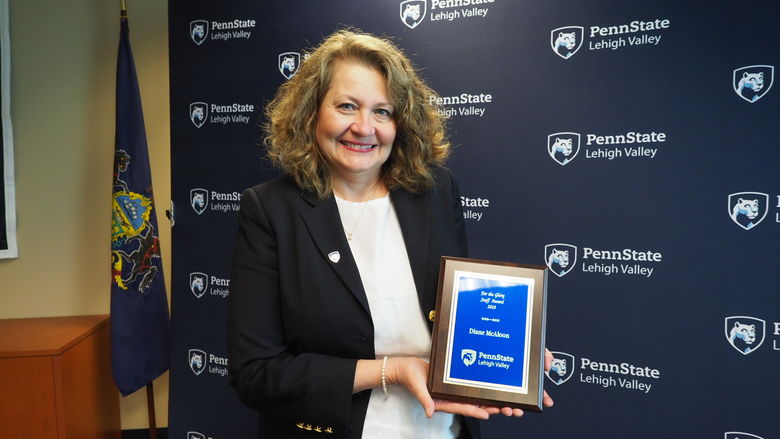 woman with a plaque