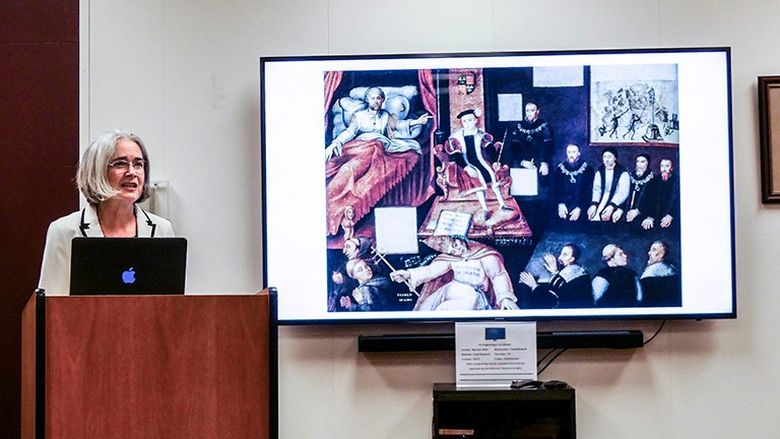 Professor presenting behind a podium