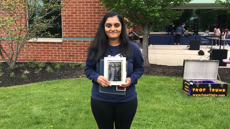 female student with award