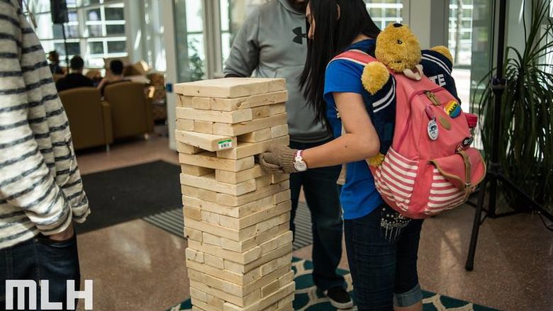 students playing JENGA