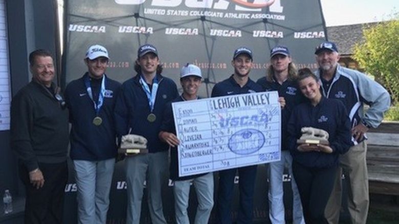 golf team posing after winning championship