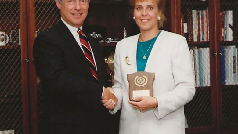 Debra Dreisbach poses with FBI official 