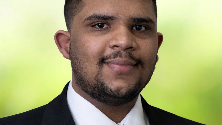 Hemil Patel in suit headshot 