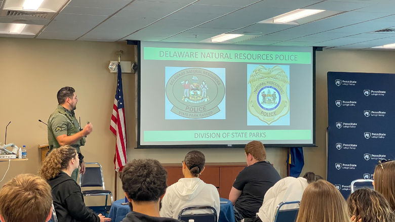 Officers from Delaware Natural Resources Police give presentation to interested CRIMJ students