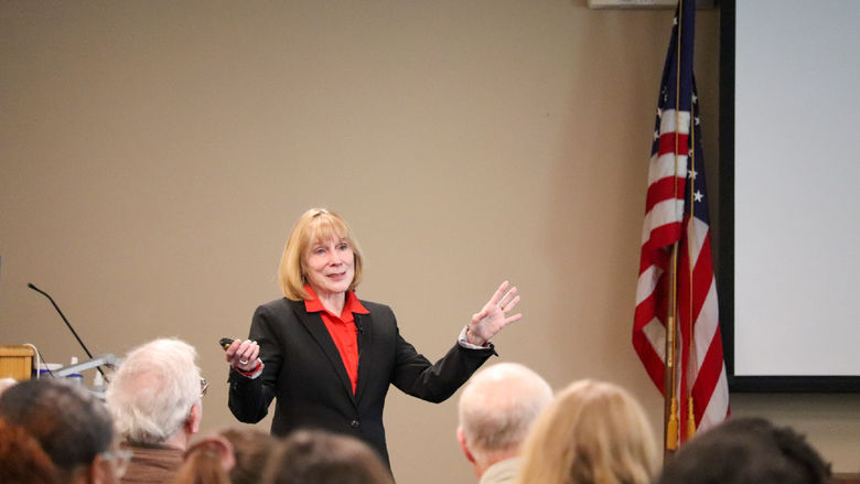 Katherine Ramsland speaking with guests at Penn State Lehigh Valley