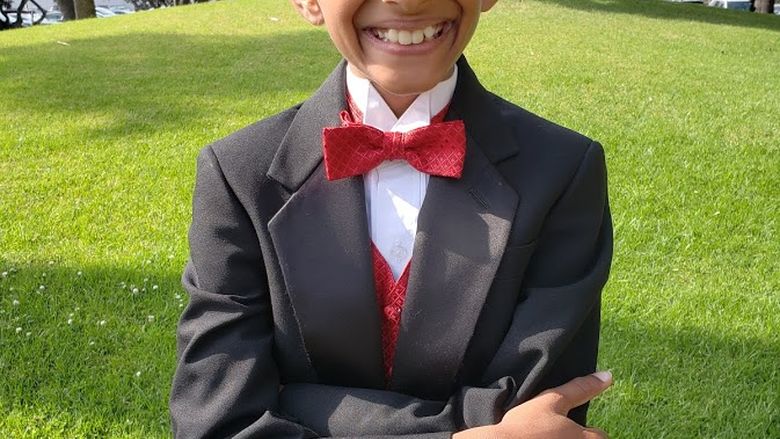 young boy in tuxedo