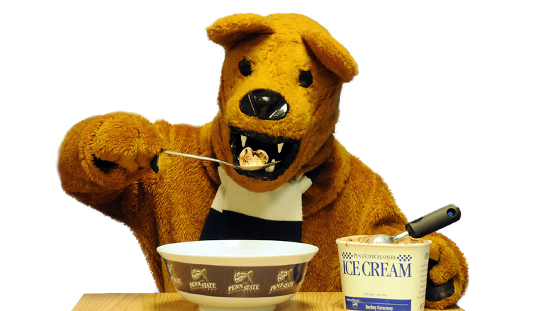 The Nittany Lion mascot digs in to a bowl of Berkey Creamery Ice Cream