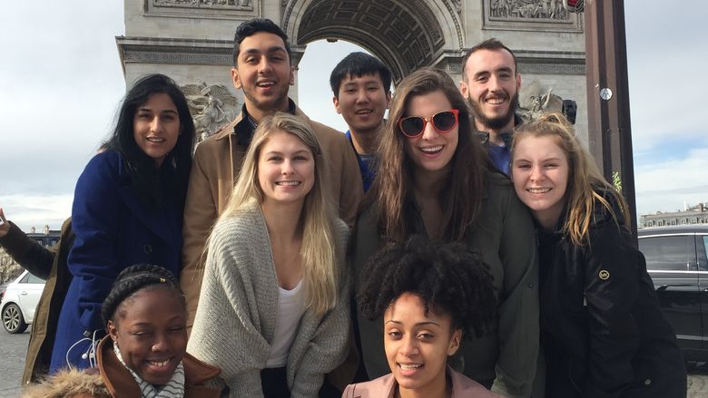 Students in front of the Arc De Triomphe in Paris