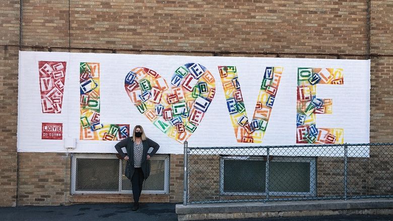 Maryam Galbiati poses near her artwork