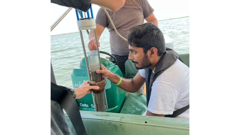 PSU-LV student, Princeton Bijou sampling the Danube River
