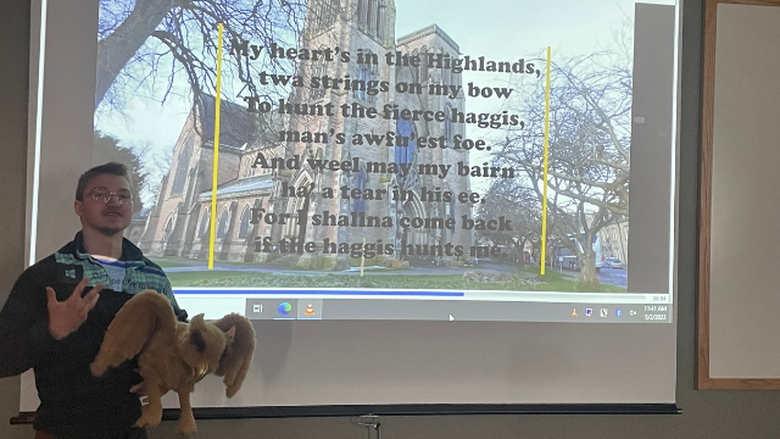 Jack Griffin, a student in the PSU-LV honors program, presents his research on the mythical Scottish haggis during the recent Scotland Film Festival event. 