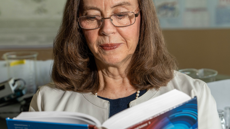 PSU-LV's Dr. Julie Ealy Reading from Textbook She Contributed too
